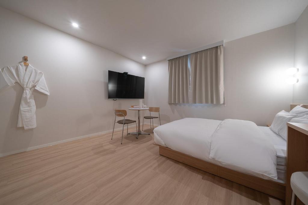 TV a/nebo společenská místnost v ubytování Aank Hotel Ilsan