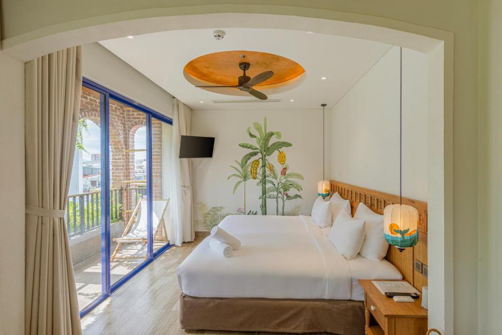 Giường trong phòng chung tại Seahorse Signature Danang Hotel by Haviland