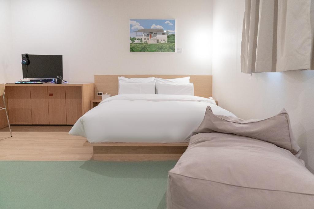 TV a/nebo společenská místnost v ubytování Aank Hotel Ilsan