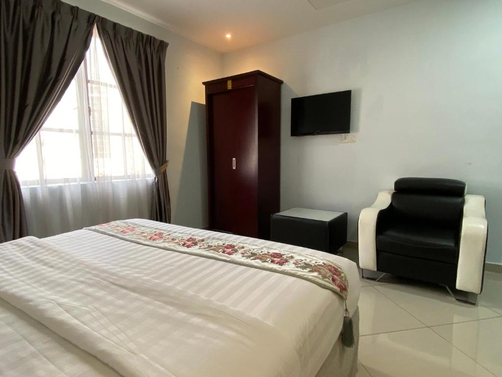Postel nebo postele na pokoji v ubytování Hotel AL Amin