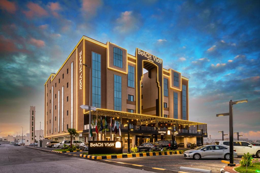 a rendering of a hotel with cars parked in a parking lot at Beach View Hotel in Dammam