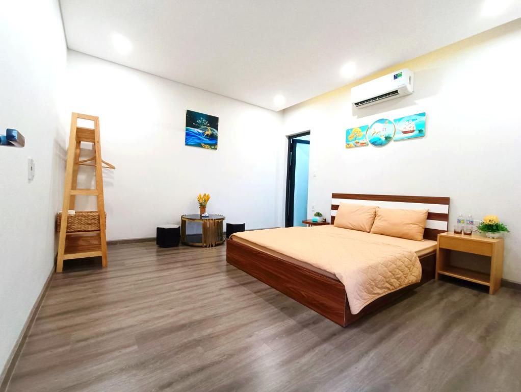 Postel nebo postele na pokoji v ubytování MyTran Homestay-HauLoan