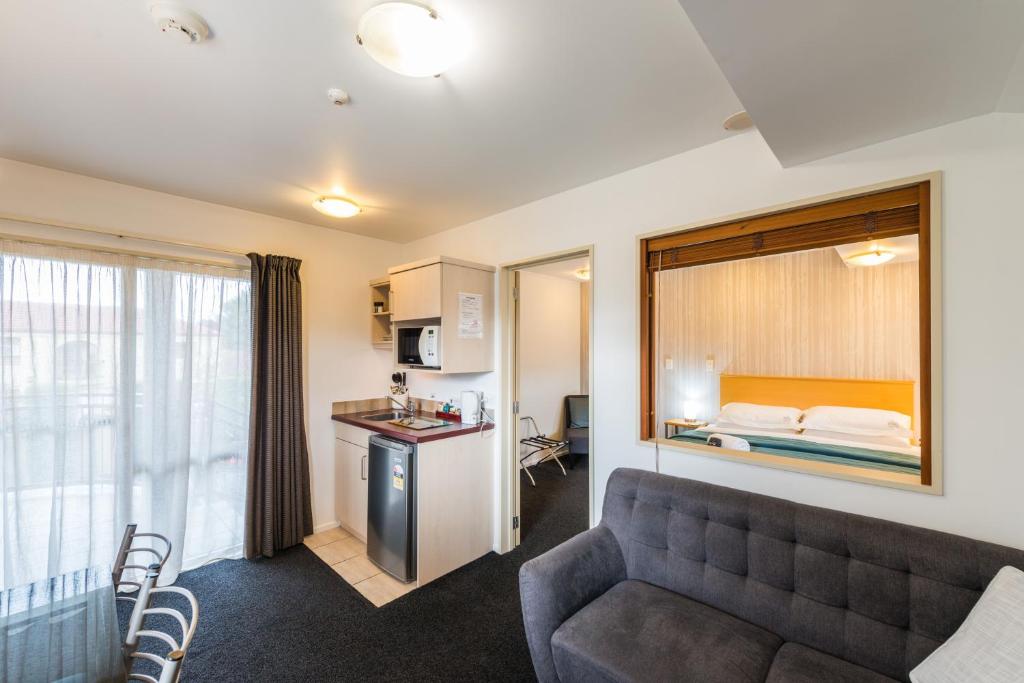Kuchyň nebo kuchyňský kout v ubytování Roma On Riccarton Motel