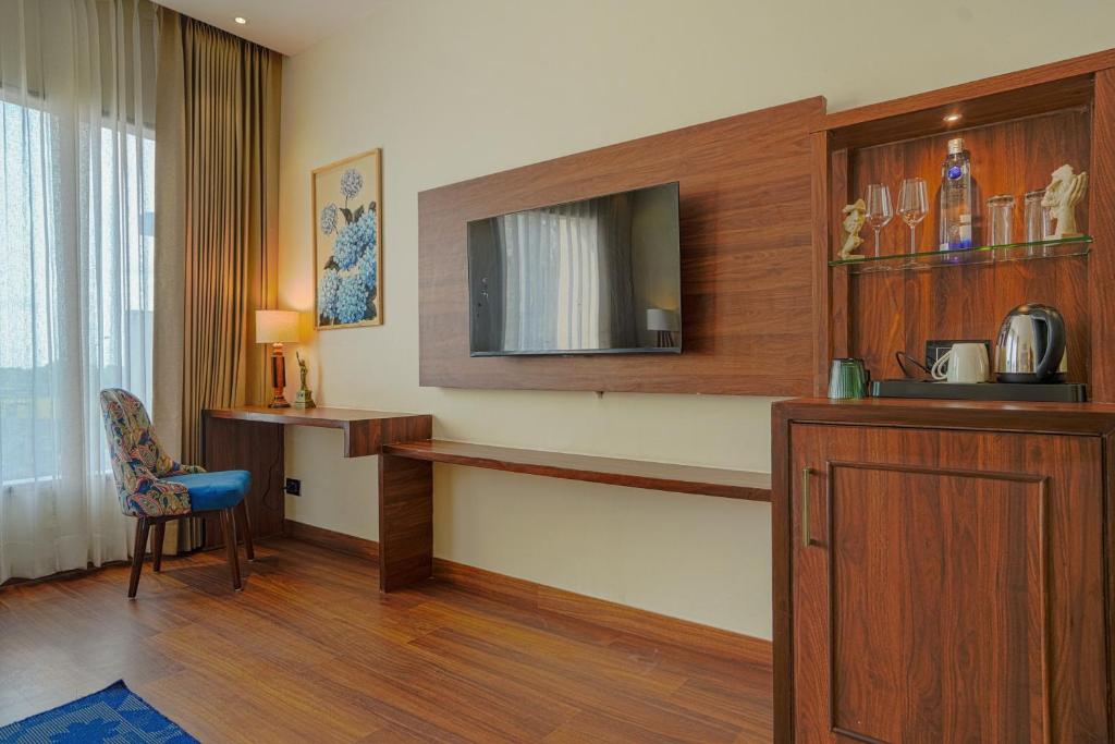 TV a/nebo společenská místnost v ubytování Hotel Escala By Levelup