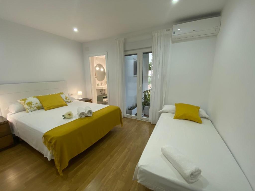 Postel nebo postele na pokoji v ubytování La Casa de Marieta "B"