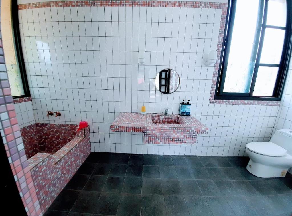 Koupelna v ubytování Kelly Field Homestay