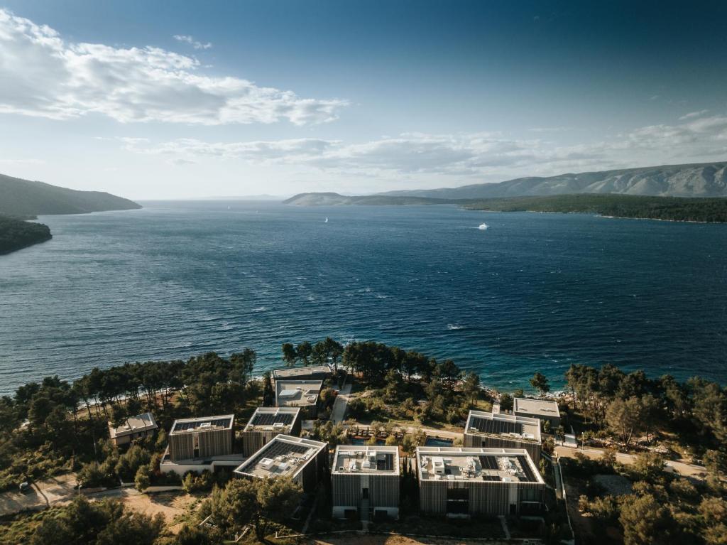 an aerial view of a resort on the water at Maslina Resort in Stari Grad