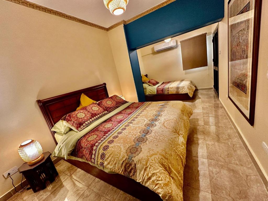 Postel nebo postele na pokoji v ubytování The Helio Suite Modern 1bdrm