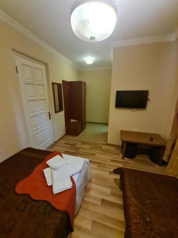 Postel nebo postele na pokoji v ubytování Piano Hotel