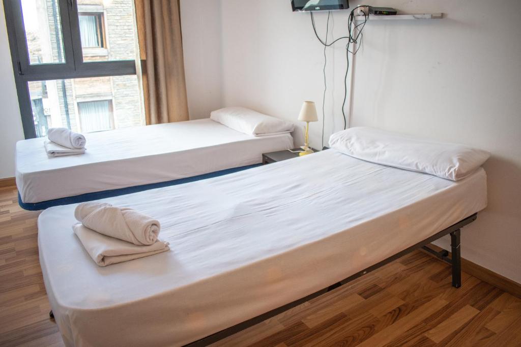 Postel nebo postele na pokoji v ubytování Apartamentos La Solana 3000