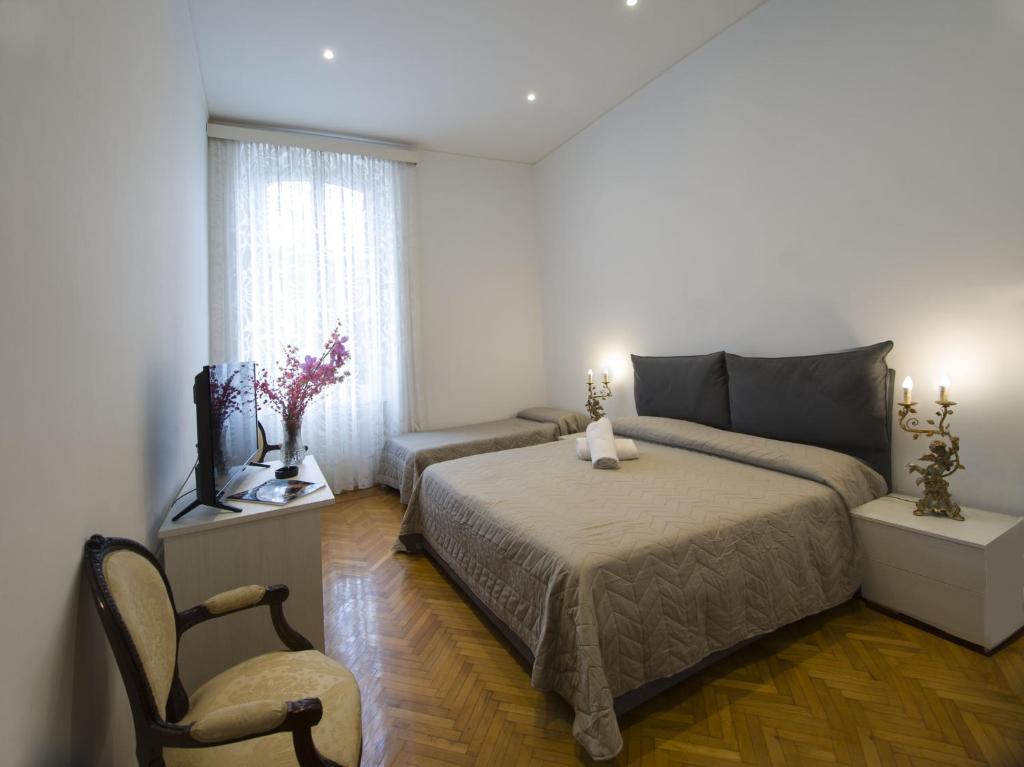 Postel nebo postele na pokoji v ubytování Hotel Alexander & Spa