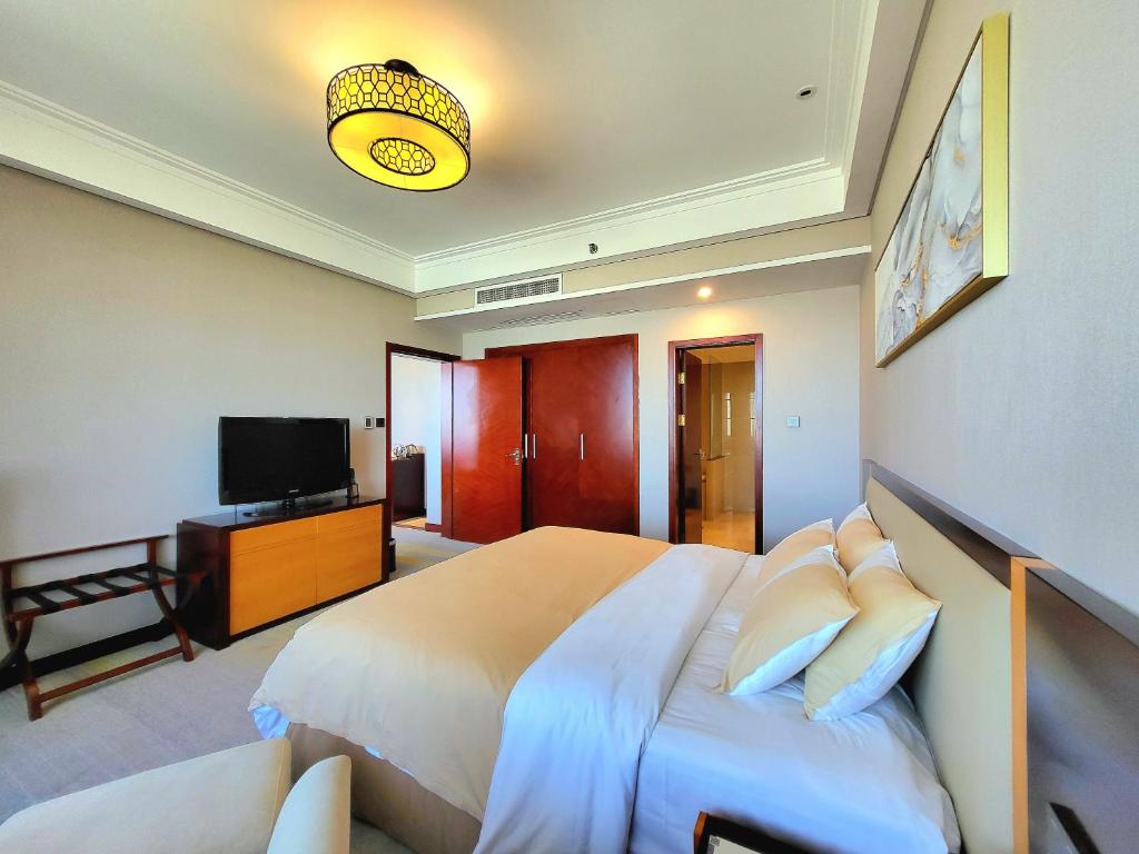 TV a/nebo společenská místnost v ubytování Tianjin Saixiang Hotel