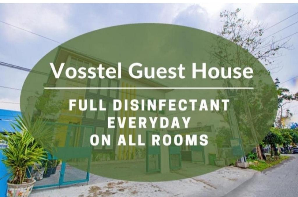 a sign that readswest guest house full differential warranty on all rooms at Vosstel Guest House in Medan