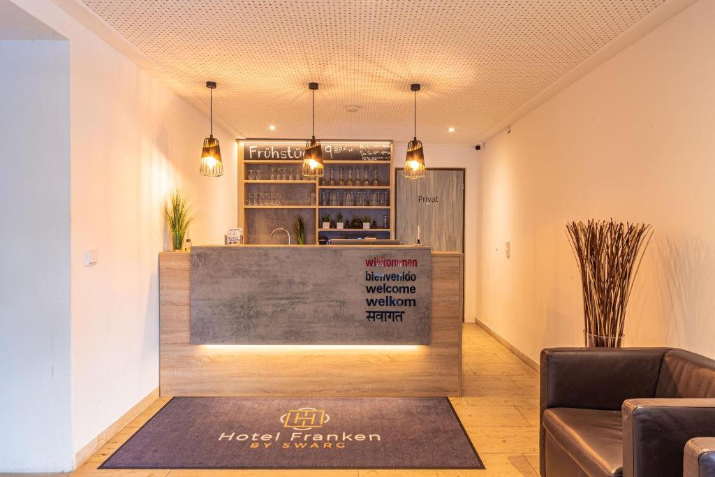 Posezení v ubytování Hotel Franken