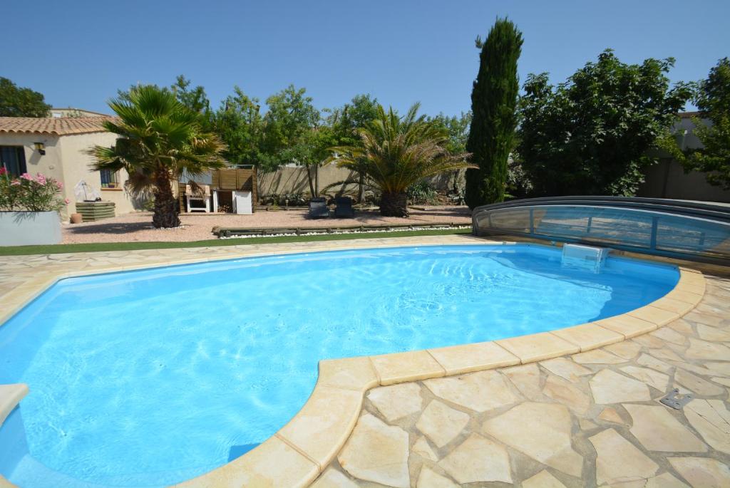 Photo de la galerie de l'établissement Studio au coeur d'un jardin reposant, à Saint-Thibéry