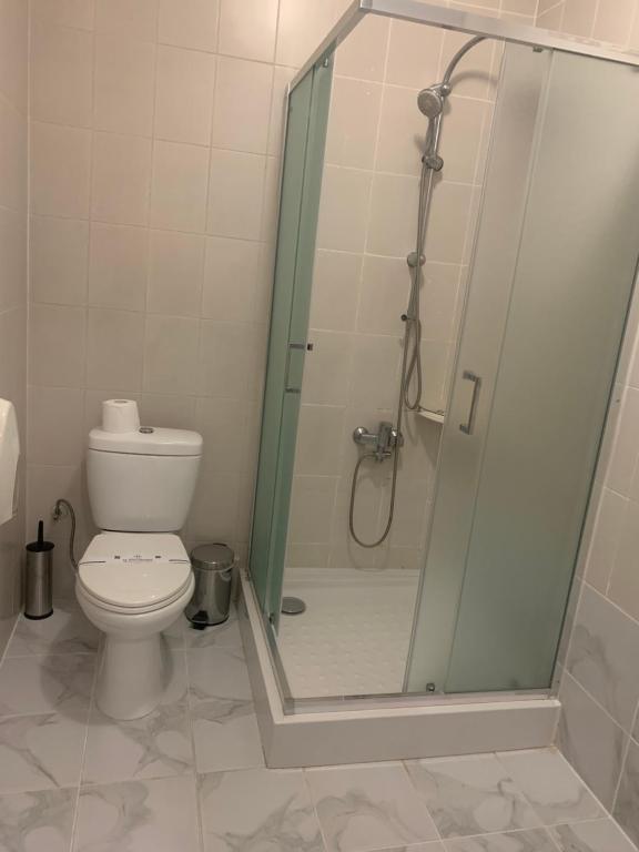 Koupelna v ubytování Atlant Hotel