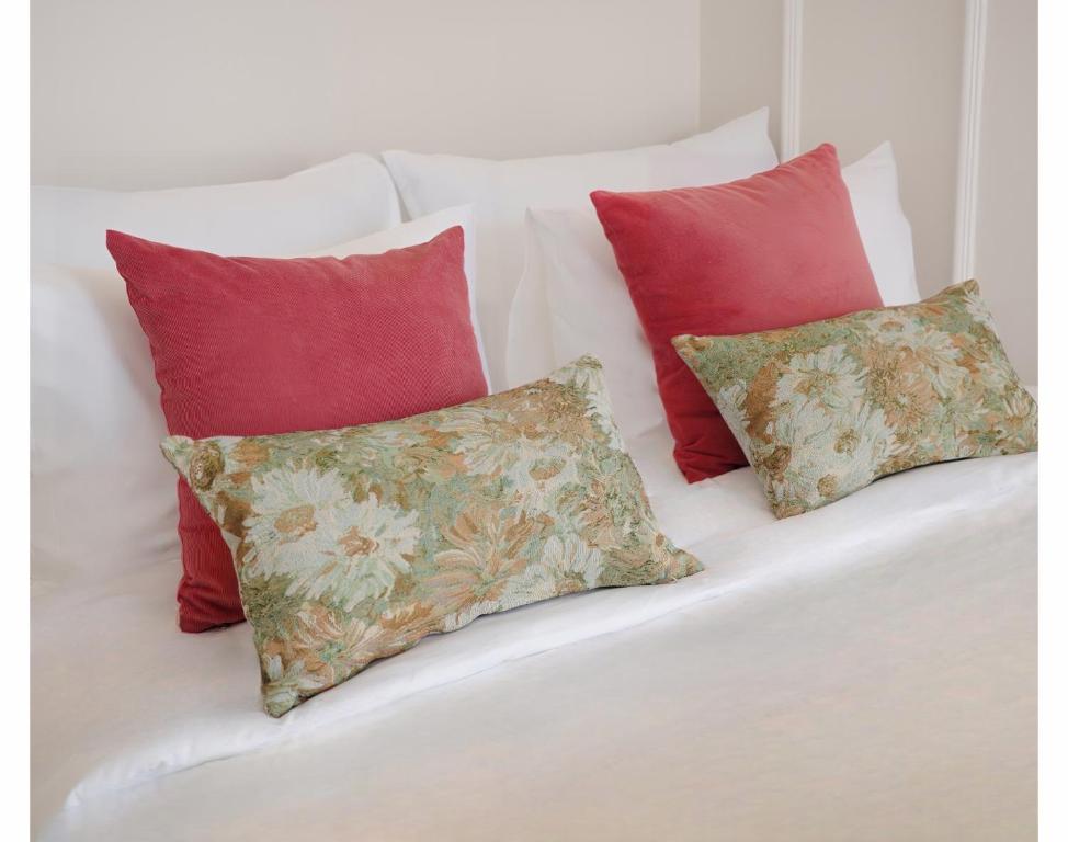 Giường trong phòng chung tại Le Macaron City Center - Boutique Hotel Đà Lạt