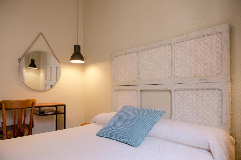 Postel nebo postele na pokoji v ubytování Vicente Home