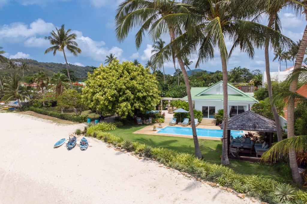 an aerial view of a house on the beach at Beachfront Villa Baan Rim Haad 3BR in Lamai