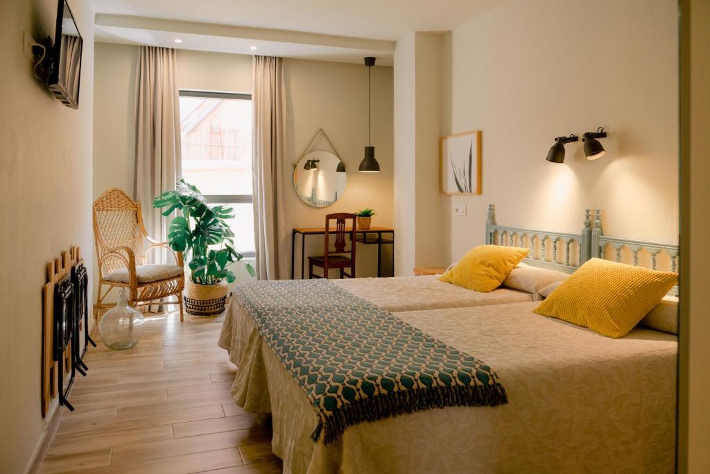 Postel nebo postele na pokoji v ubytování Vicente Home