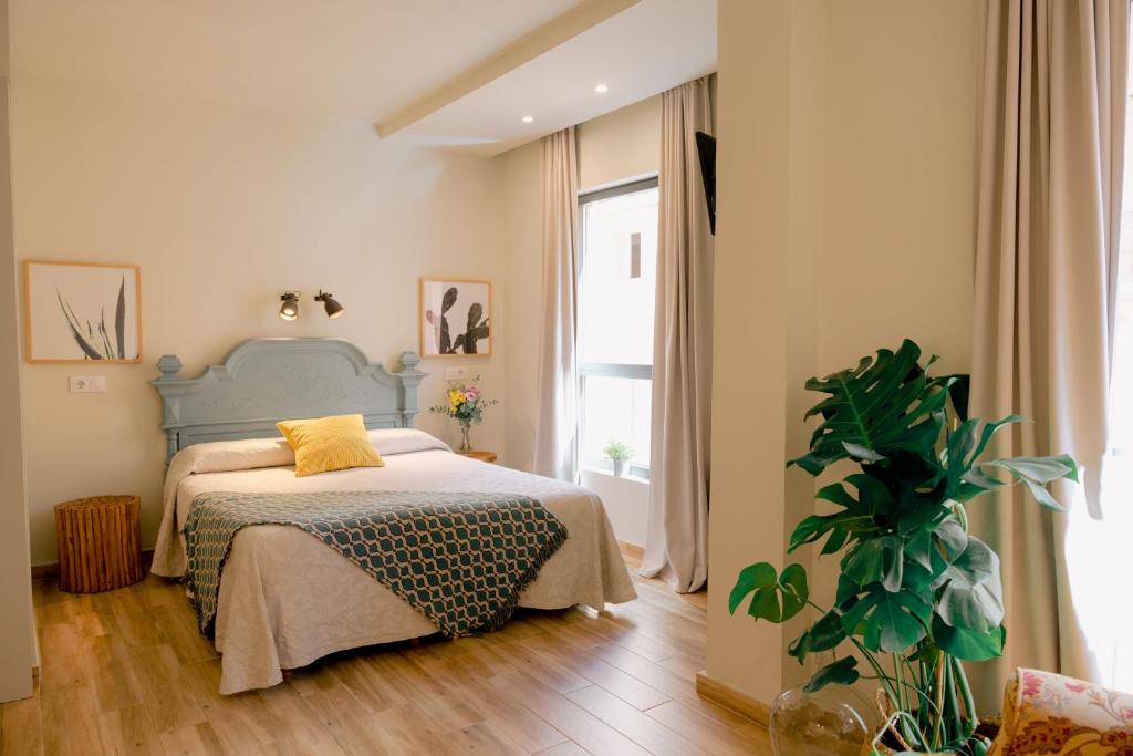 Postel nebo postele na pokoji v ubytování Vicente Home