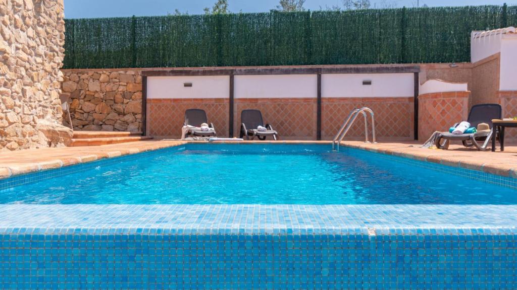 Bazén v ubytovaní Villa Infinity Torrox by Ruralidays alebo v jeho blízkosti