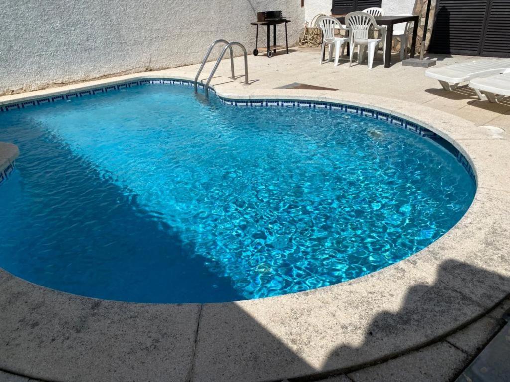 The swimming pool at or close to Casa Saguer