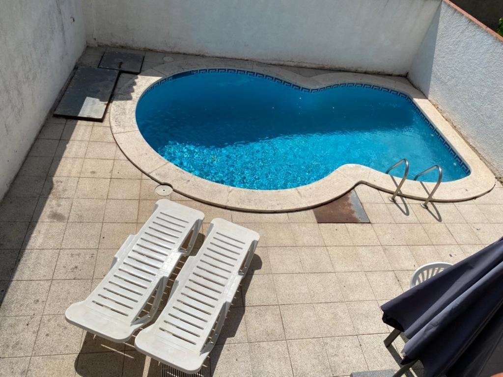 The swimming pool at or close to Casa Saguer