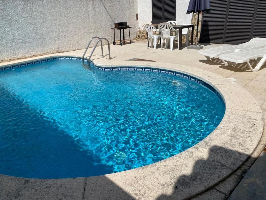 The swimming pool at or close to Casa Saguer