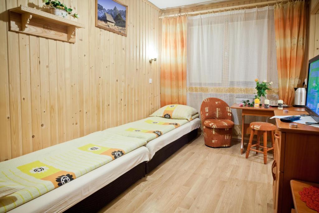 TV a/nebo společenská místnost v ubytování Smyrecek-centrum Bukowiny