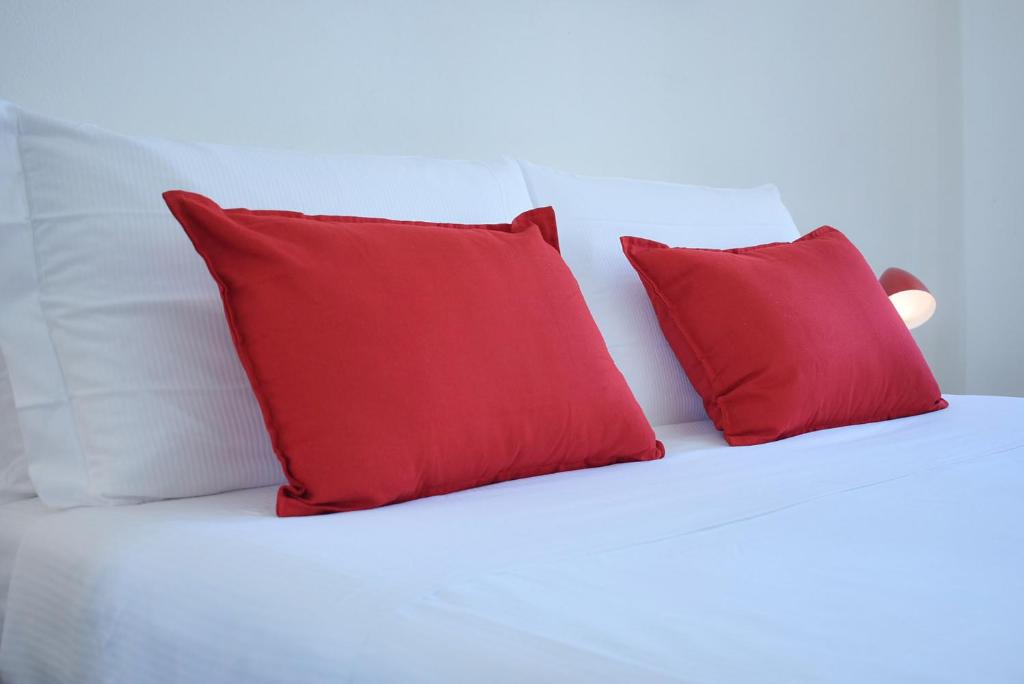 Posteľ alebo postele v izbe v ubytovaní Welc-ōm Santa Giustina apartment
