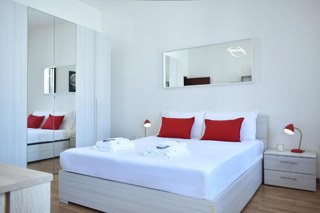 Posteľ alebo postele v izbe v ubytovaní Welc-ōm Santa Giustina apartment