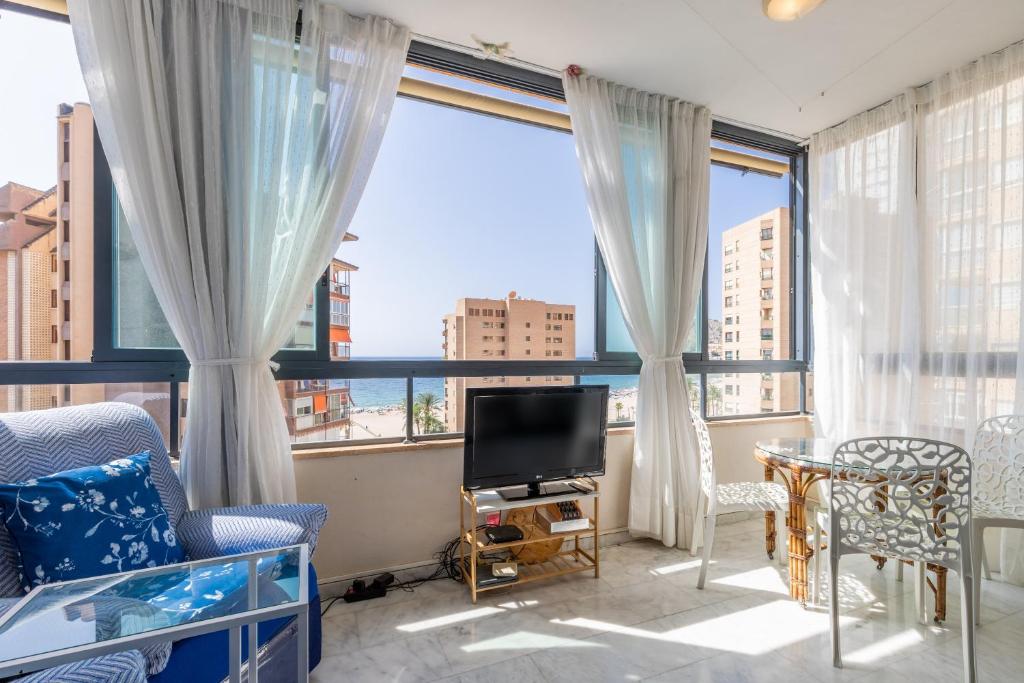 TV a/nebo společenská místnost v ubytování Apartamento Paraíso Florida