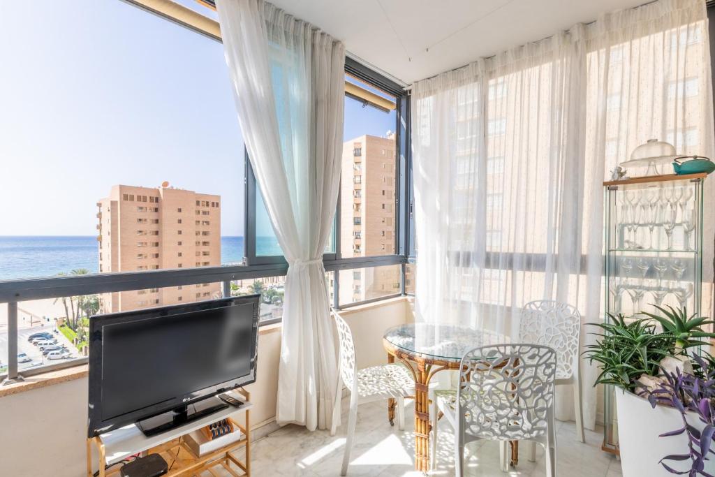 TV a/nebo společenská místnost v ubytování Apartamento Paraíso Florida