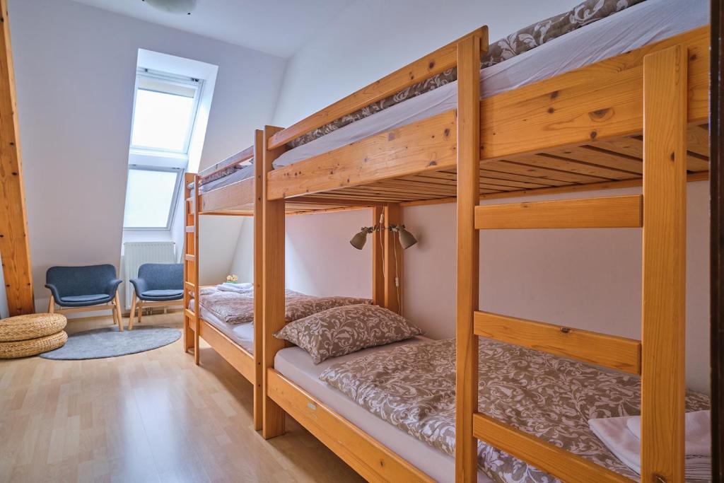 Postel nebo postele na pokoji v ubytování Samostan Mekinje