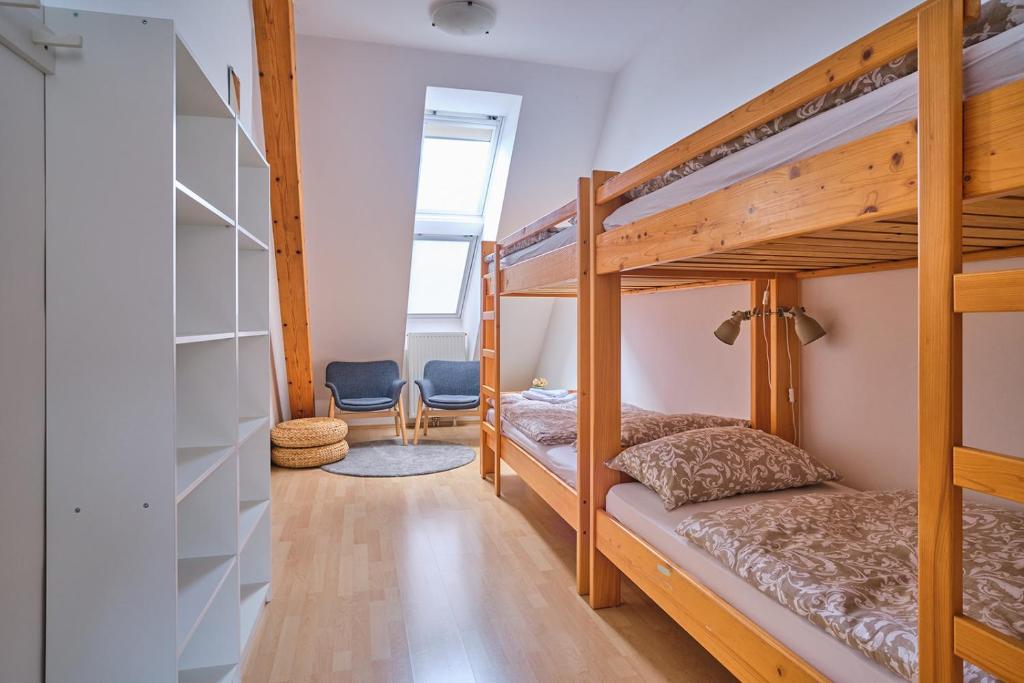 Postel nebo postele na pokoji v ubytování Samostan Mekinje