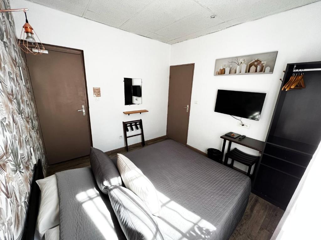 TV a/nebo společenská místnost v ubytování Hotel Abelia