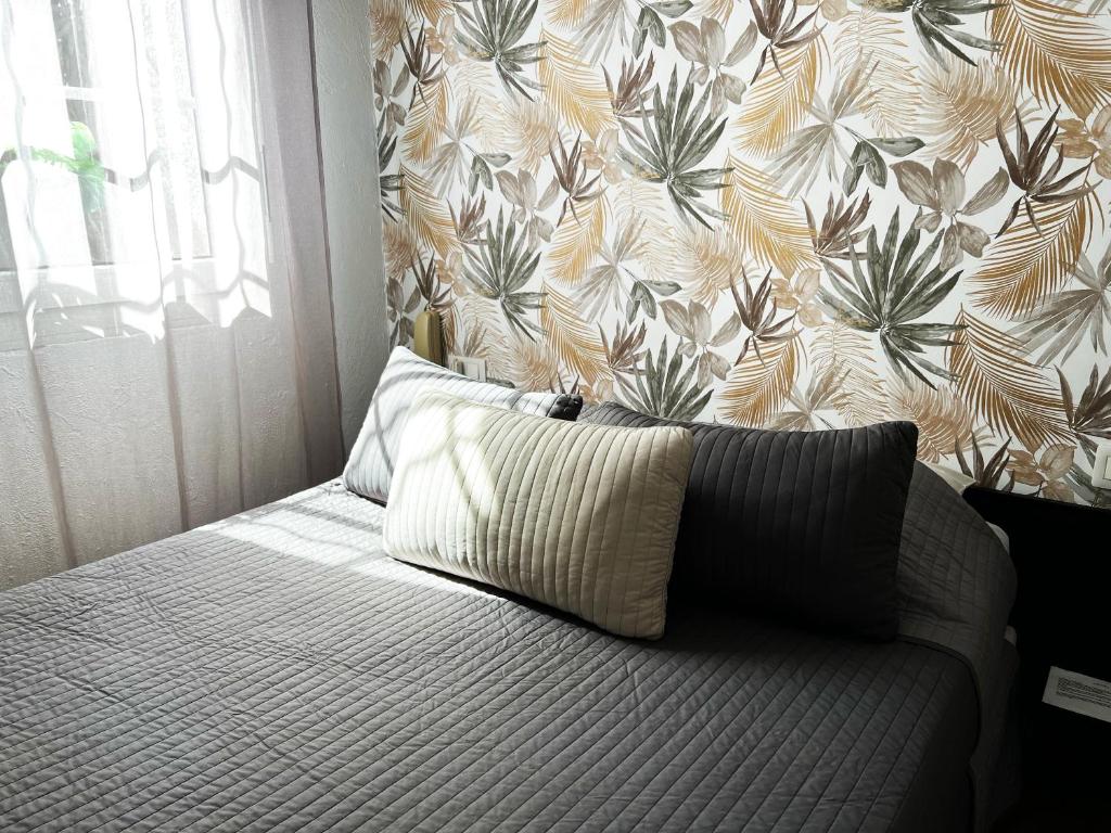 Postel nebo postele na pokoji v ubytování Hotel Abelia