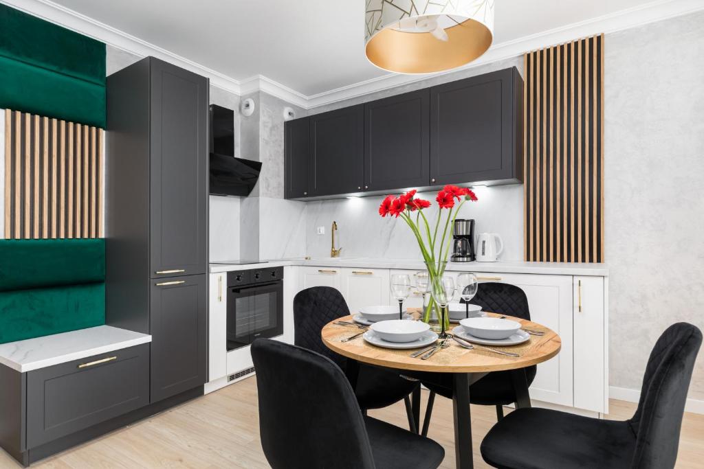 Posedenie v ubytovaní Green Square Apartments Świnoujście by Noclegi Renters