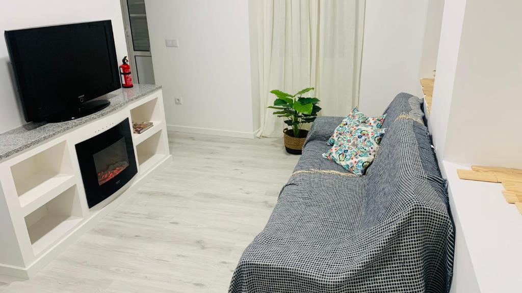 TV a/nebo společenská místnost v ubytování Beira Rio