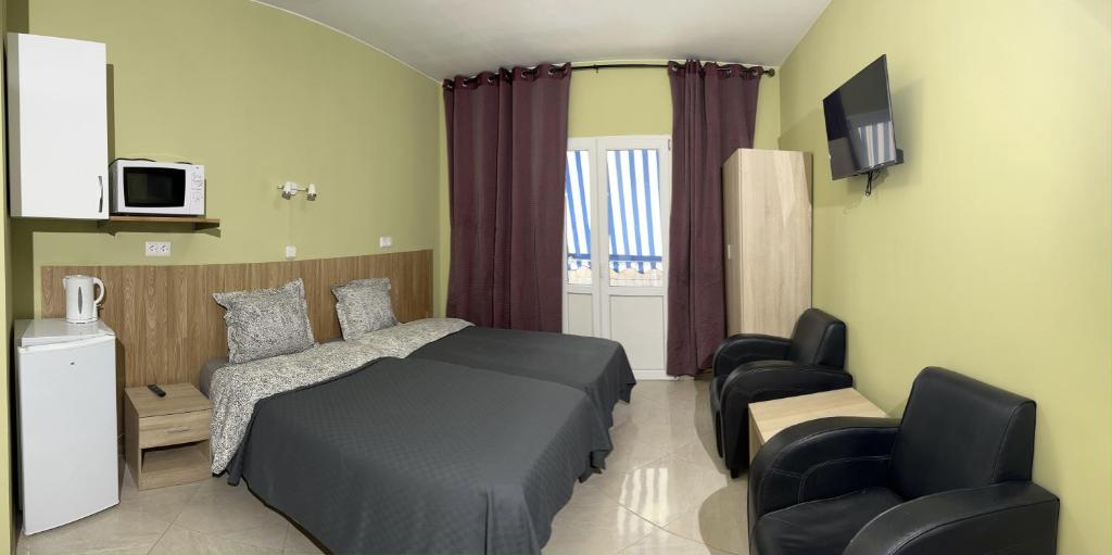 TV a/nebo společenská místnost v ubytování Mini-hotel Casa de la Luz