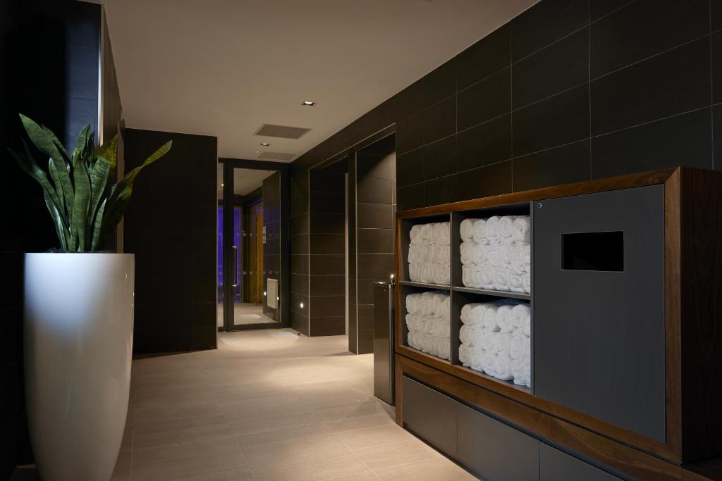 TV a/nebo společenská místnost v ubytování INNSiDE by Meliá Manchester