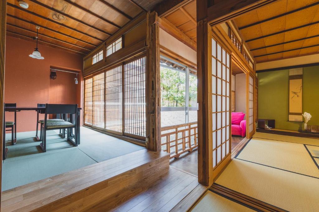 Postel nebo postele na pokoji v ubytování Ryokan Masuya