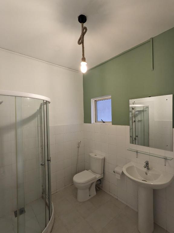 Koupelna v ubytování Palmyrah Residencies