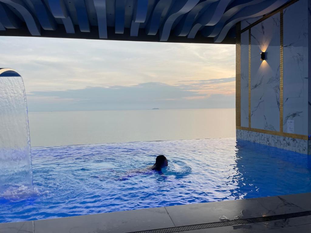 Bazén v ubytování Copacabana jomtien beach high floor nebo v jeho okolí