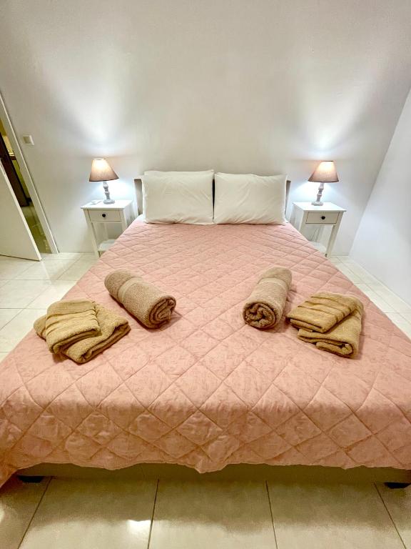 Postel nebo postele na pokoji v ubytování Masefa villa