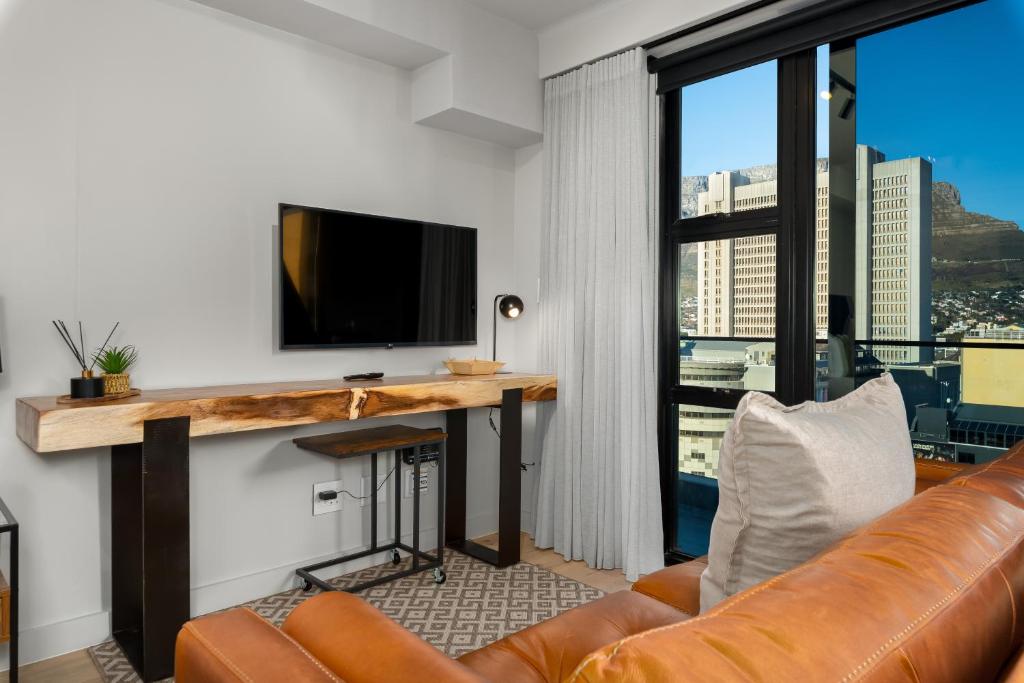 TV a/nebo společenská místnost v ubytování The Tokyo Aparthotel by Totalstay