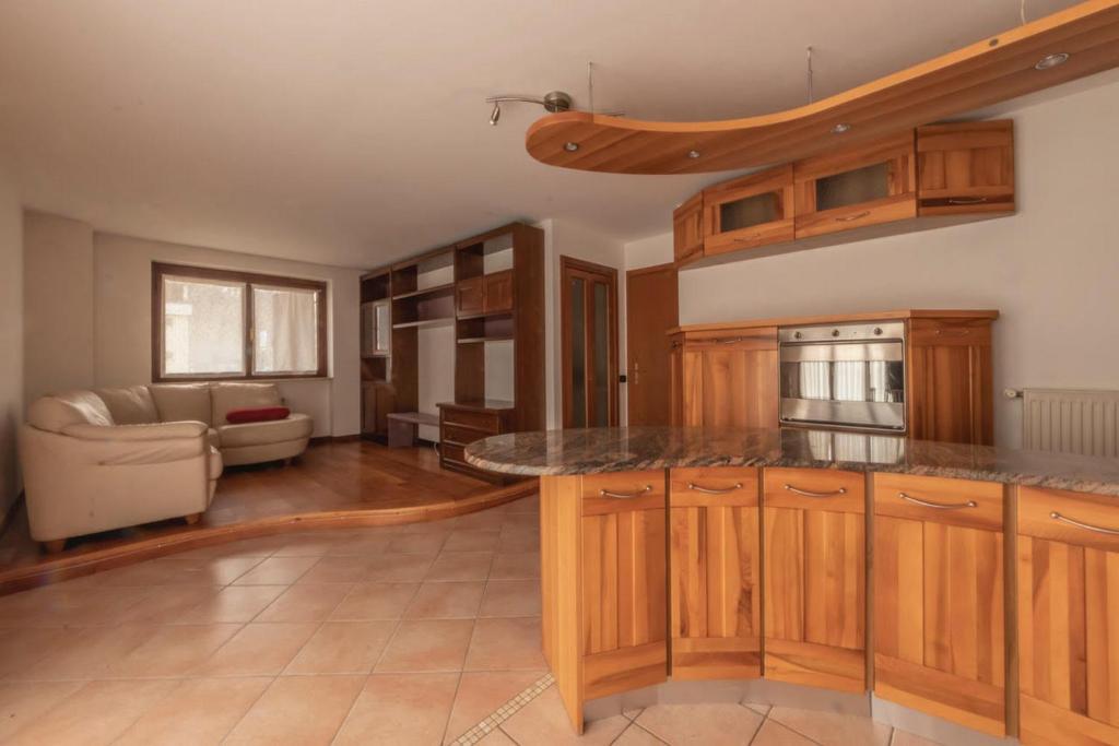 Kuchyň nebo kuchyňský kout v ubytování Appartamento LA CONCA, Alpago