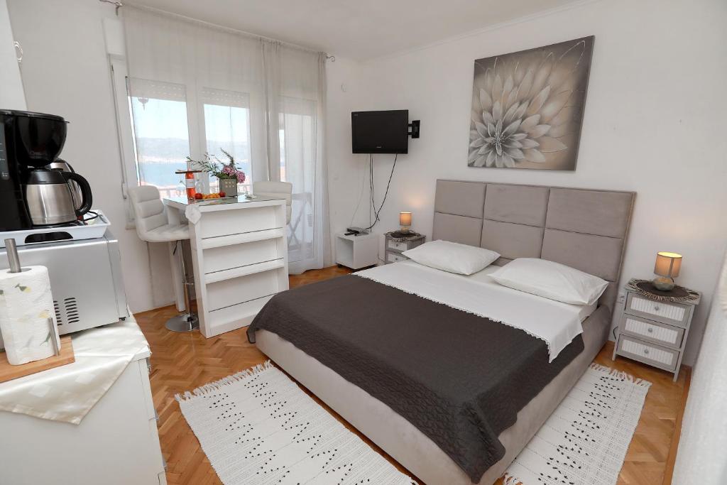 Posteľ alebo postele v izbe v ubytovaní Apartments ITD