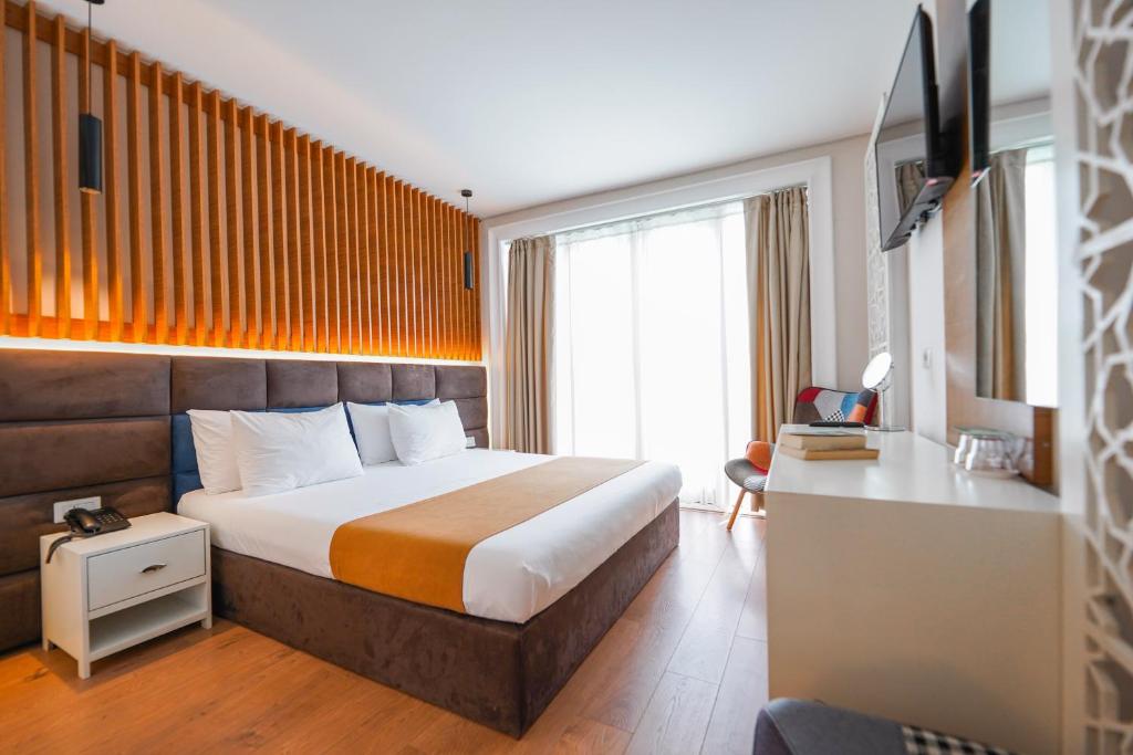Postel nebo postele na pokoji v ubytování Vinea Resort